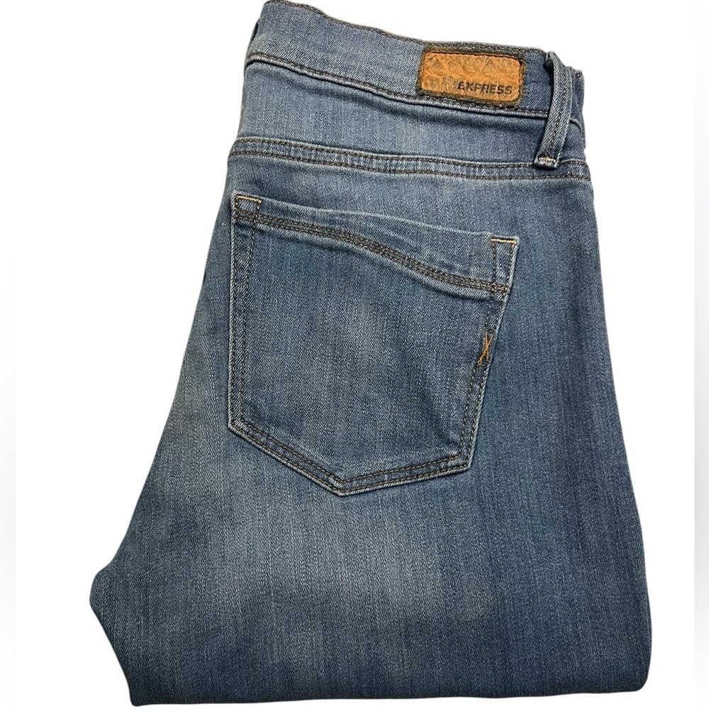 Express • Distressed Light Wash Skinny Jeans